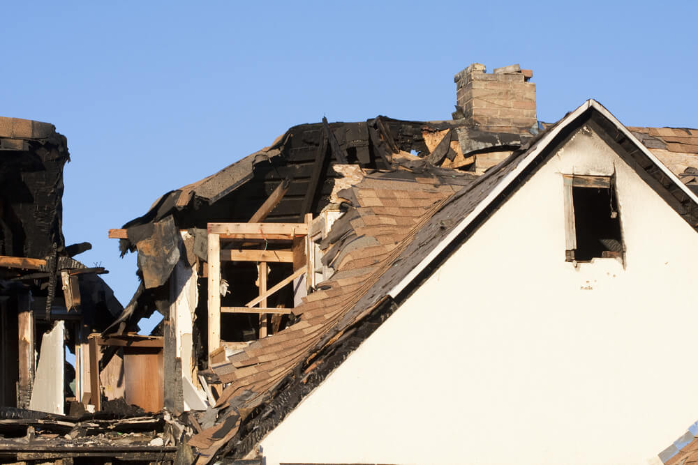 Damaged House Photo of Damaged Home