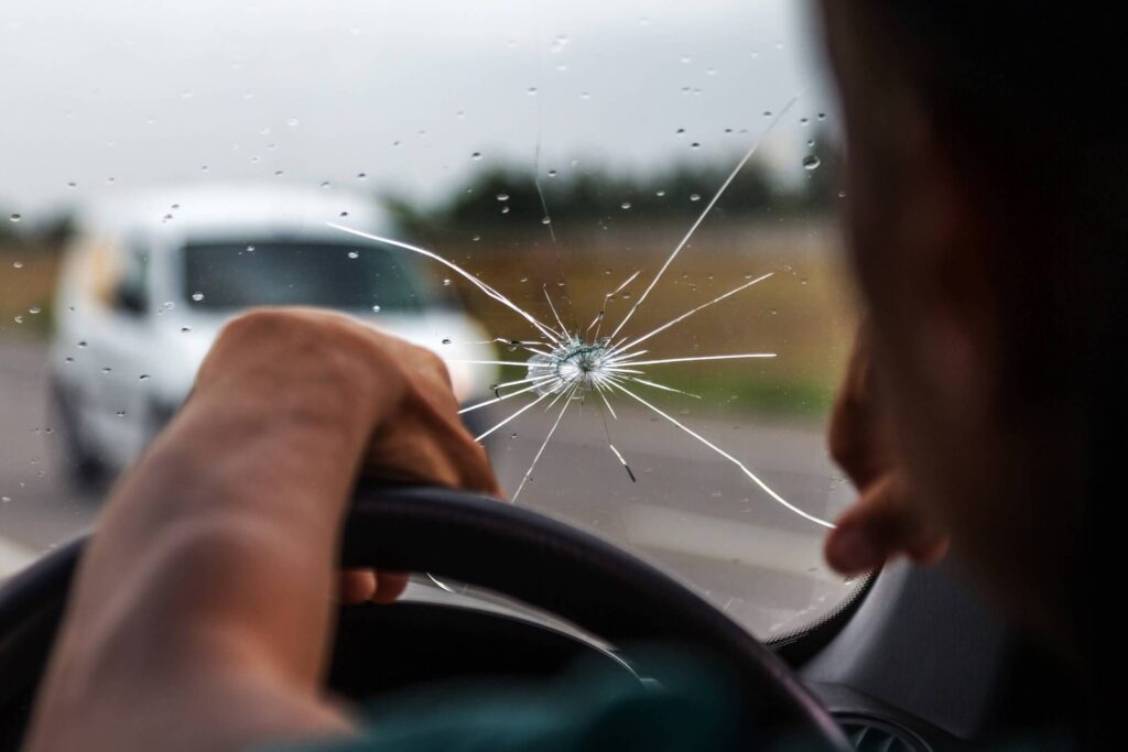 Broken car windshield Broken car windshield